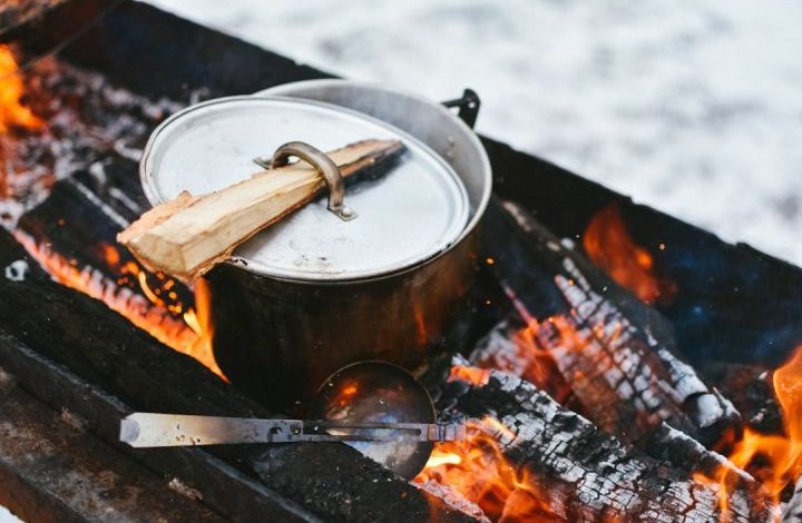 Outdoor Cooking - silver cook pot on firewood