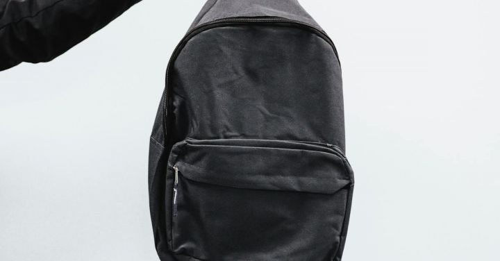 Backpack - Person Holding Black Backpack